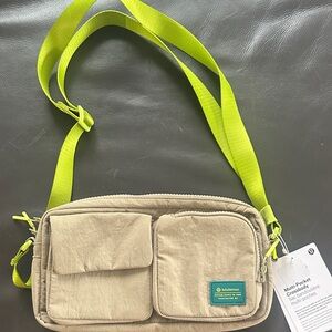 lululemon athletica Beige Crossbody Bag with Neon Yellow Strap